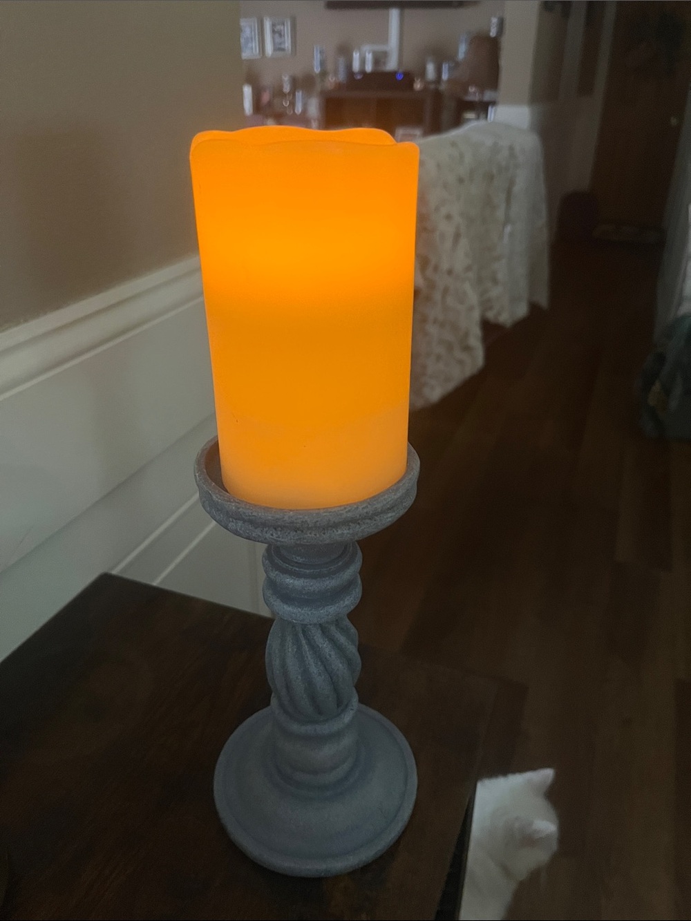 Flicker LED Pillar Candle in Warm Amber on blue Gray Pedestal